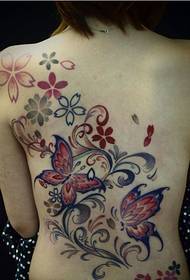 mergaitės nugaros drugelio vynuogių gėlių tatuiruotės modelio paveikslėlis