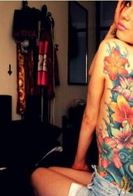 Kobieta z powrotem kolor kwiat tatuaż wzór obrazu