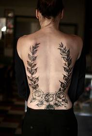 Szexi női hátul csak gyönyörű fekete-fehér virág tetoválás
