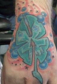 Hand back colored jellyfish like clover tattoo pattern