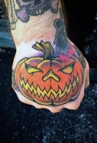 Egyszerű színes rajzfilm tök tetoválás minta a kéz hátsó részén