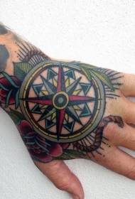 Hand back old school colored compass and red rose tattoo pattern