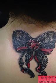 Tattoo muster soovitas naise selja pitsi vibu tätoveeringu mustrit