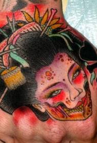 Mano indietro modello di tatuaggio geisha mostro colorato stile asiatico