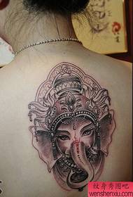 Black and gray like a tattoo in the back