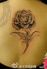 Bellissimo modello di tatuaggio rosa grigio scuro sul retro delle ragazze