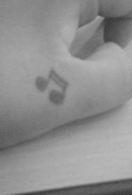 Schwaarz musikalesch Notiz Logo Hand zréck Tattoo Muster