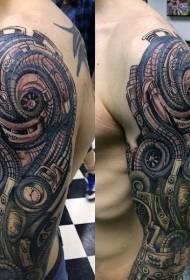 Ruka obojena raznim mehaničkim uzorcima tetovaža
