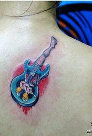 Beautiful and beautiful bass tattoos on the back of girls