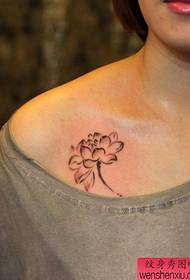 Woman clavicle lotus tattoo pattern