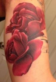 Bras couleur deux délicats motifs de tatouage rose rouge