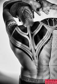 Anbefalet mandlig ryg enkel bag hvid totem tatovering billede
