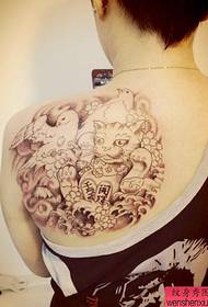 Woman back lucky cat tattoo work