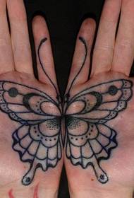 Butterfly tattoo artwork picture in palm