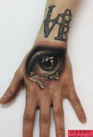 Braç popular patró de tatuatges d’ulls desgarradors