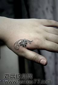 Beautiful-looking four-leaf clover tattoo