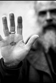 Personality pattern tattoo on the palm