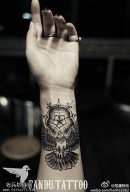 Hand fan flower eagle tattoo work by tattoo