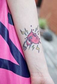 Rosa hjärta mönster handleden tatuering bild
