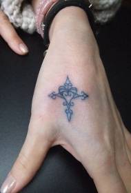 Mano piccola croce modello tatuaggio