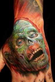 Šareni zombi oblik tetovaže lica na stražnjoj strani ruke