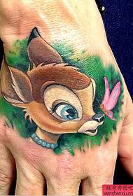 A cute sika deer tattoo on the back of the hand