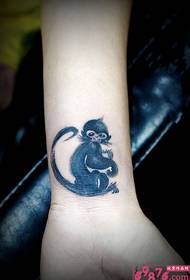 Roztomilý atrament opice zápästia tetovanie obrázok