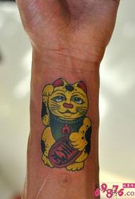 Lucky cat tattoo picture on hand