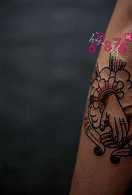 Paar geluk hand in hand tattoo foto