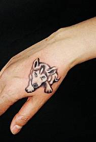 Image de tatouage chiot main