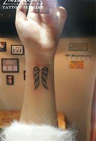 Wrist wings tattoo pattern