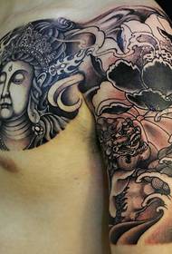 Lotus a Buddha kombinéiert mat engem hallwen Tattoo Muster