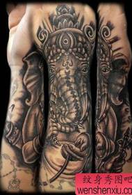 Arm swartgrize oaljefant god tattoo patroan