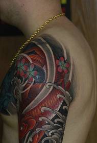 Slika zasljepljujuće polusatne tetovaže s sirenom i lignjama