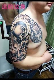 Tatuaggio mezzo armatura Buddha tatuaggio Shanghai voyage tattoo