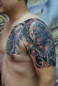 Male lelei lelei le afa-vae Tang lion tattoo