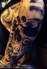 Black skull tattoo pattern