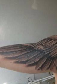 Mannelijke grote arm zwarte vleugels tattoo patroon