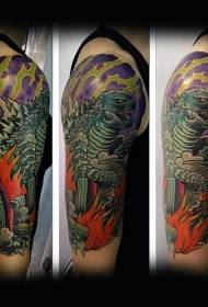 Brazo colorido godzilla ruina ciudad tatuaje patrón