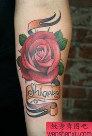 Arm color rose tattoo