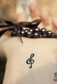 ຮູບແຕ້ມ Tattoo ຮູບແບບຂໍ້ແນະ ນຳ: Arm Totem Tattoo Tattoo Pattern