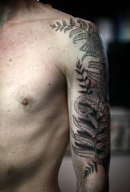 Vyriškos rankos juodo paparčio lapo augalo tatuiruotės modelis