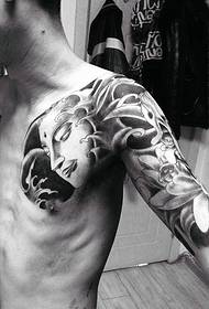 Picha ya tattoo ya nyeusi na nyeupe nusu pamoja na Buddha na uchawi