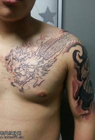 Modèle de tatouage de dragon à griffe de dent