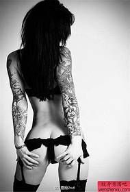 female double flower arm tattoo work
