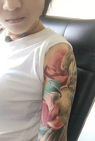 Tatuatge de fènix de braç de flor de noia blanca