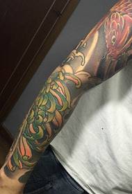 Blommorarm bläckfisk tatuering bild lämplig för ungdomar