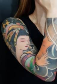 9 traditional style flower arm tattoo pictures