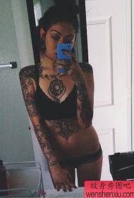 the best tattoo museum recommended a female black gray flower arm tattoo