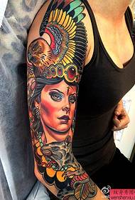 a school flower arm tattoo pattern